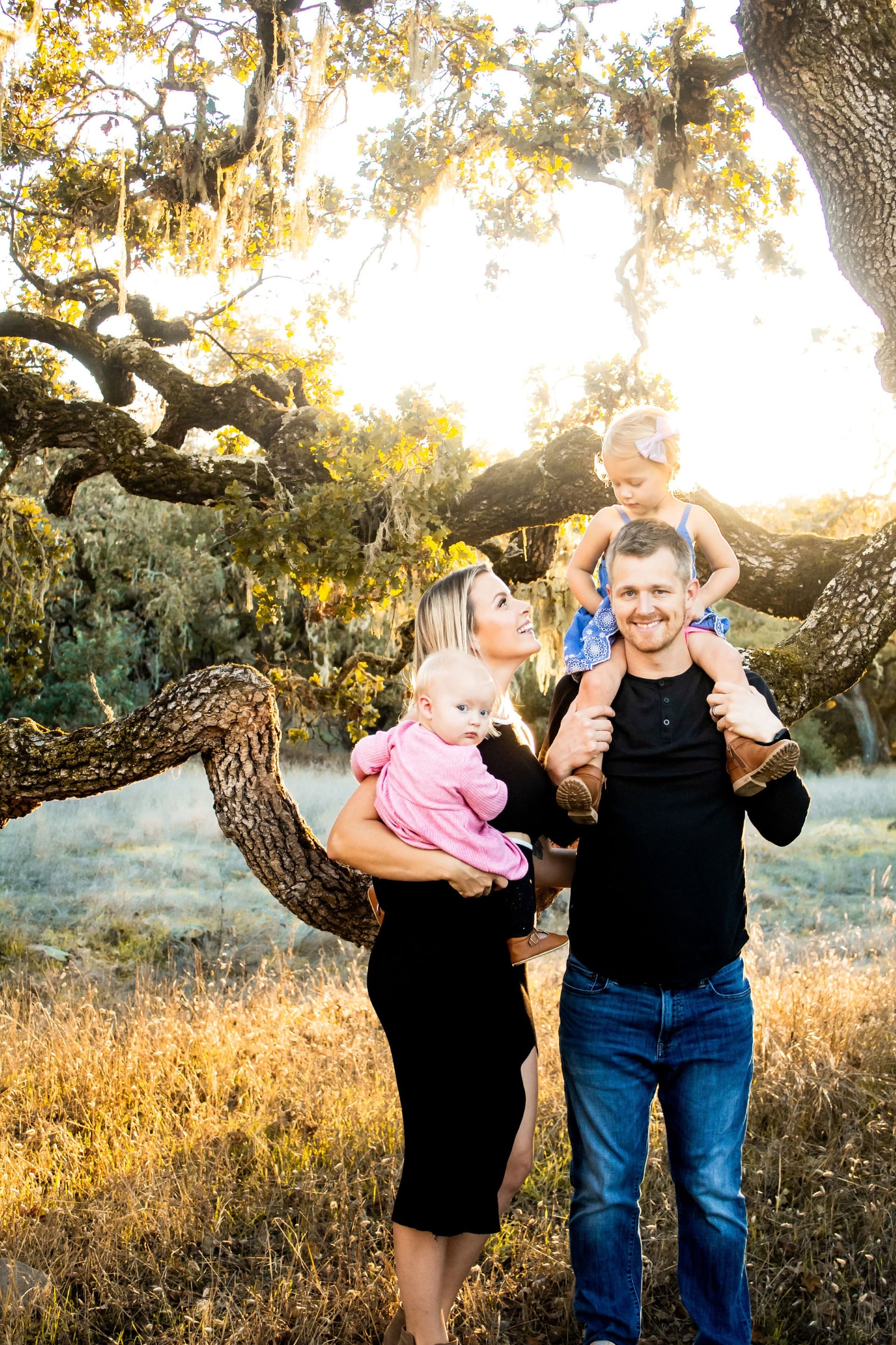 Kyle with his wife and their two daughters